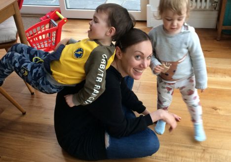 Mother with two young children